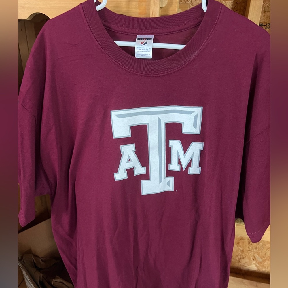Men’s Texas A & M t-shirt, new without tags, 2 XL, maroon with white logo